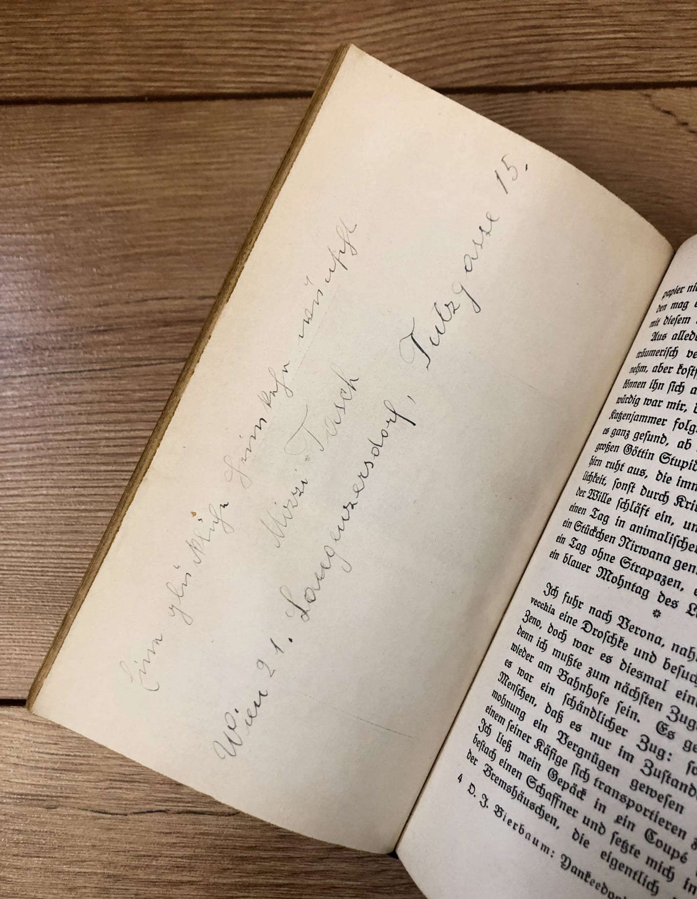 Photo: “Handwritten inscription in an old book”